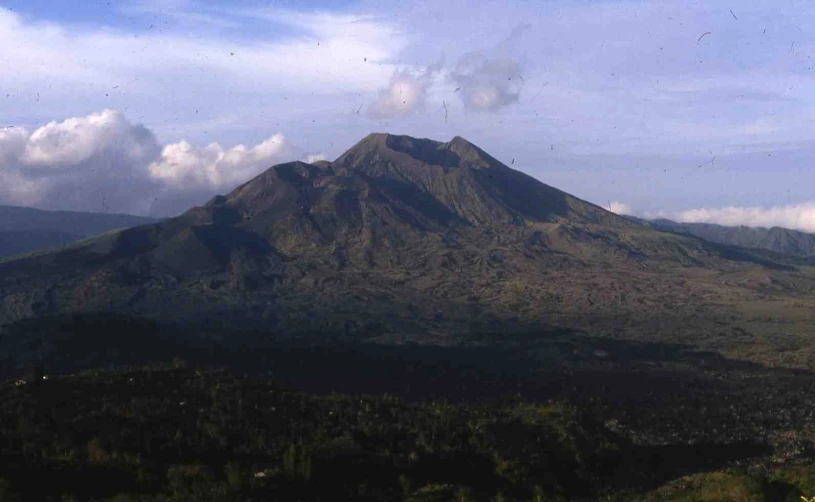 a distant view of a mountain peak, taken from the side