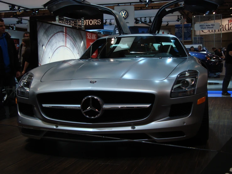 a mercedes sports car is on display at the showroom