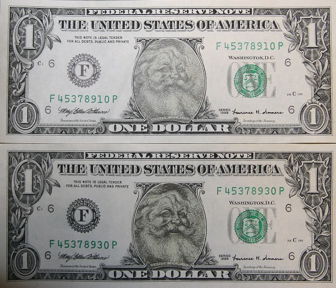 a close up image of two fake dollar bills
