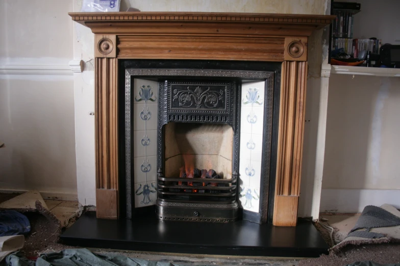 an image of a fire place setting in the room