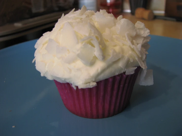 a close up of a cupcake on a plate