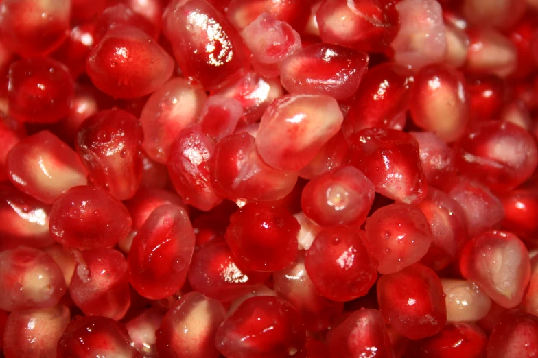 close up view of a bunch of pomegranates