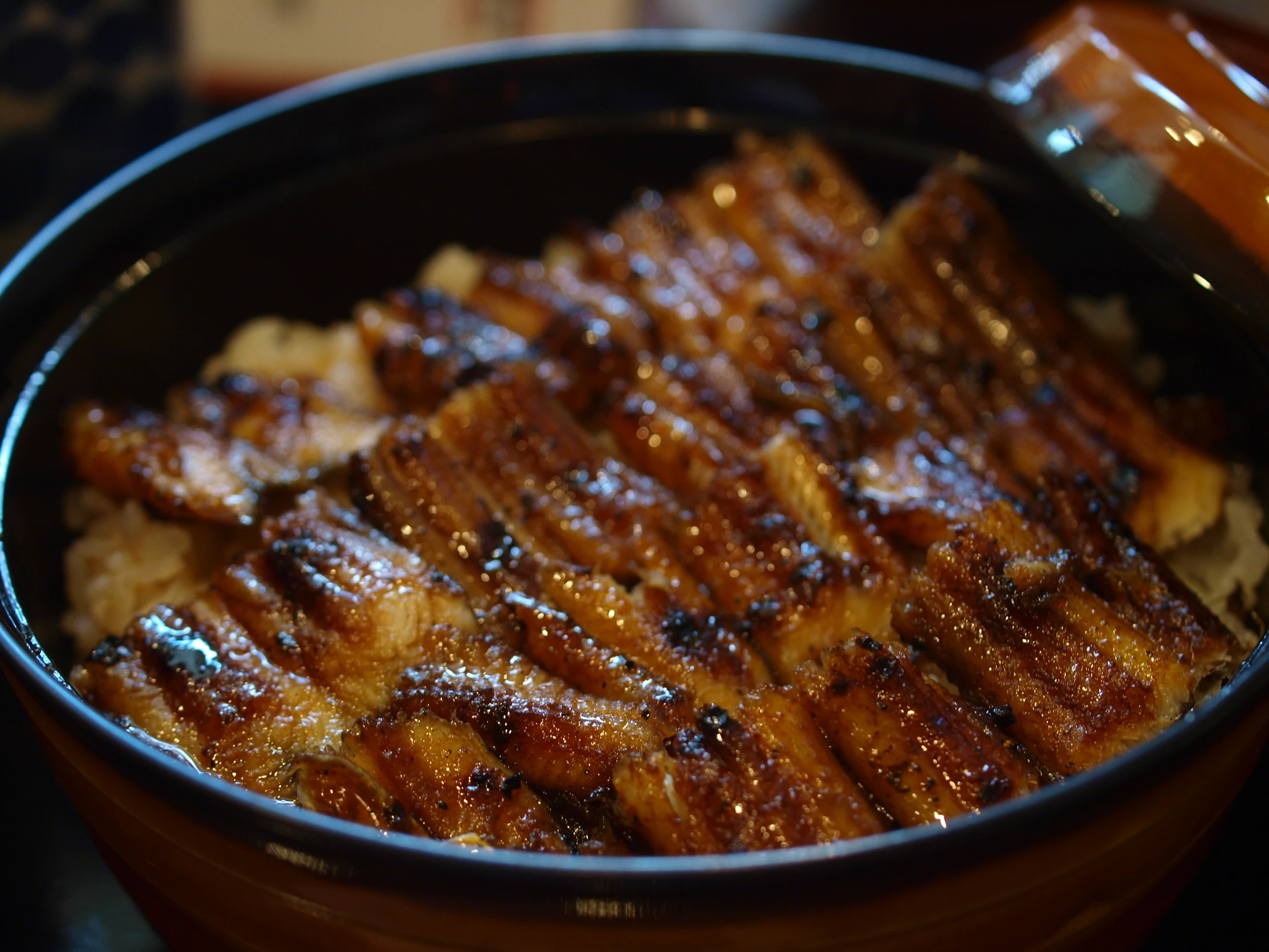 some ribs and mashed potatoes in a bowl