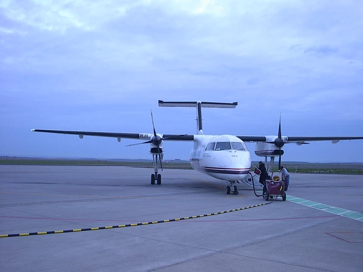 an airplane that is sitting in an airport