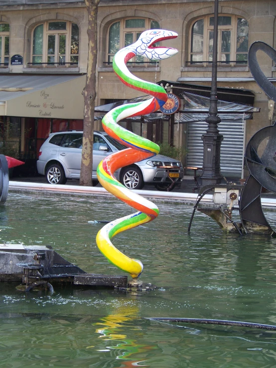 an object floating in the water on a street