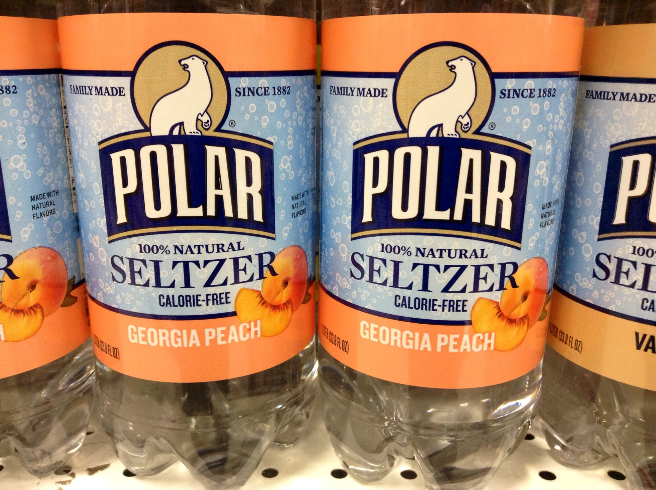 bottles of polish seawater are on a rack