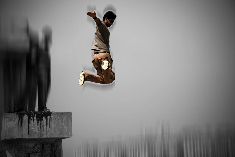 a man doing tricks on a skateboard while others watch