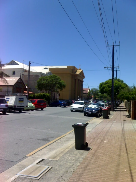 a street with many cars on the street