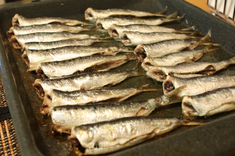 a pan filled with food sitting on a table