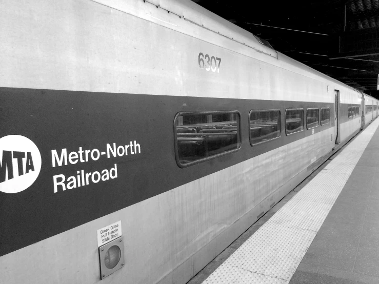 a black and white po of a metro train