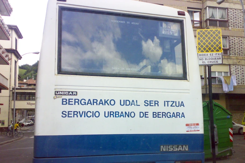 a bus parked in front of a building