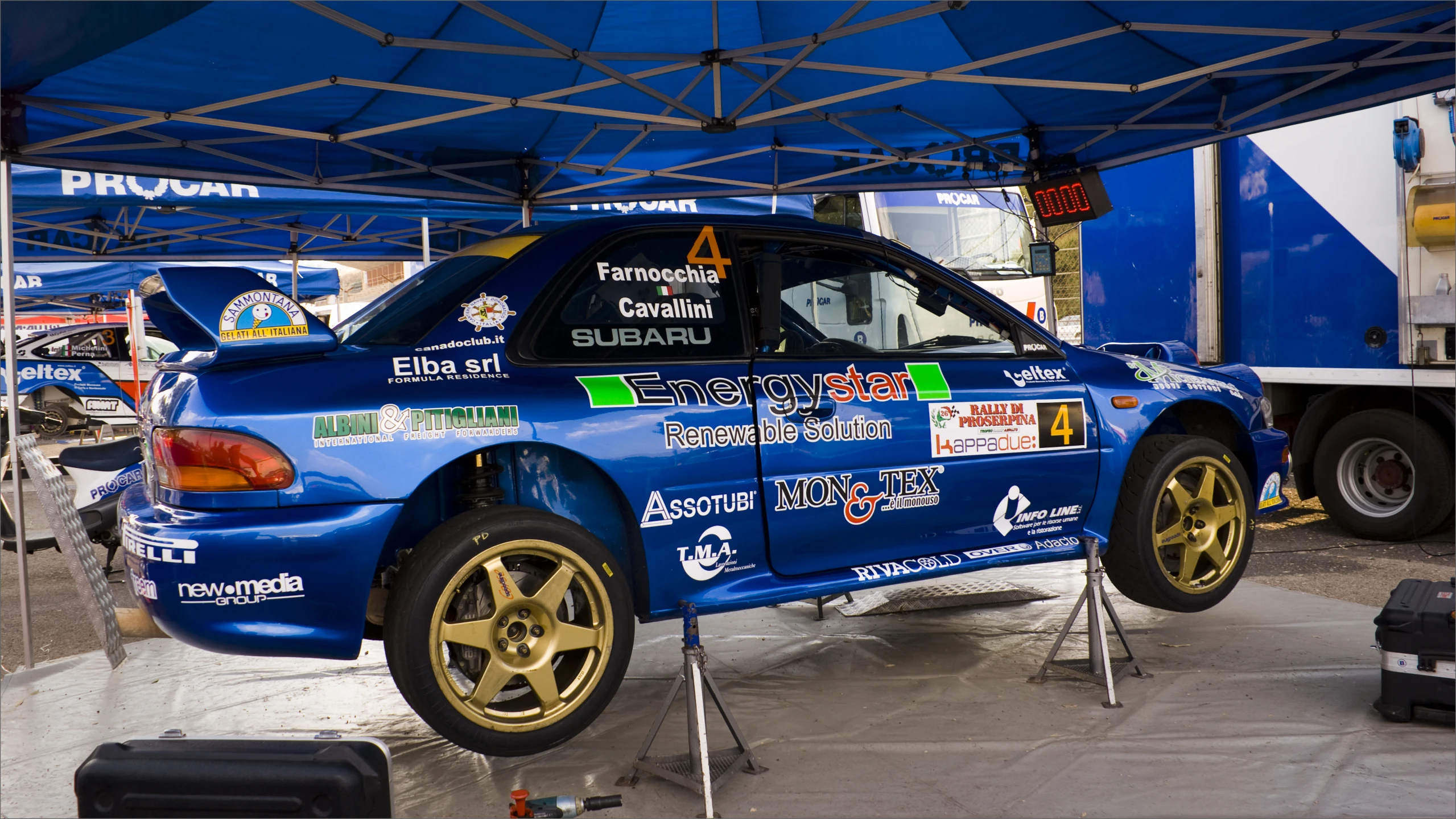 a car on display with stickers on its side