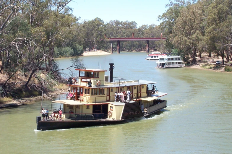 a large boat that is floating in some water