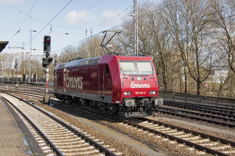 a train is on the tracks beside a platform