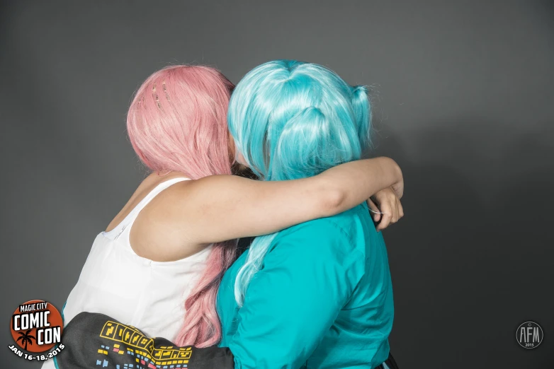 two s hugging each other with colored hair