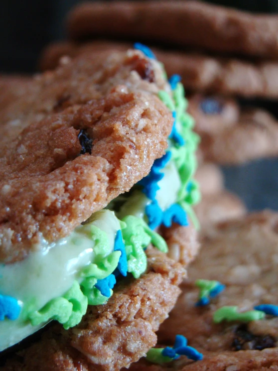 the sandwich is topped with icing and cookies