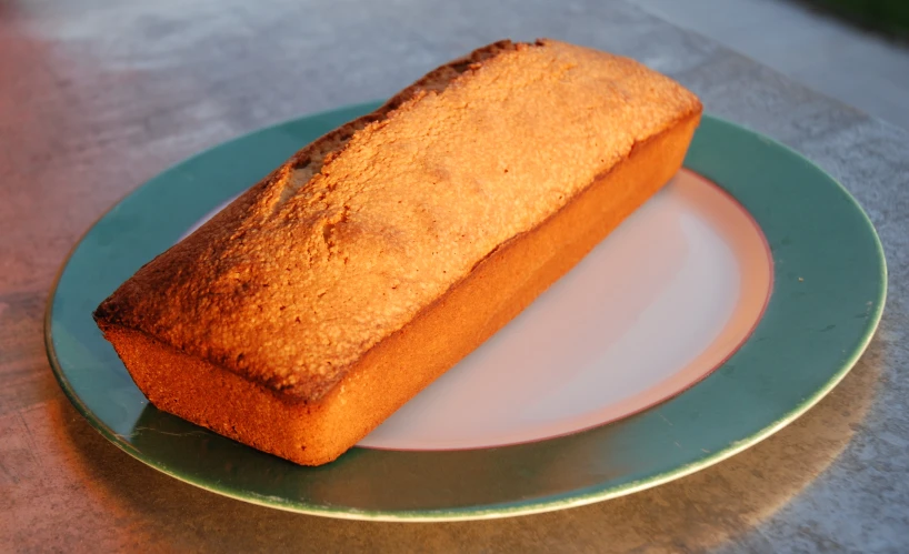 a cake sits on top of a blue plate