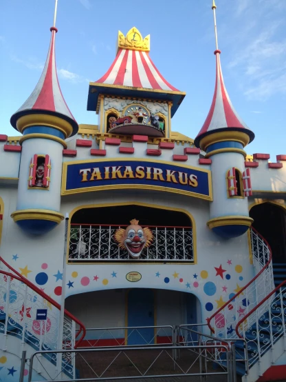 a carnival building that is painted to look like a circus