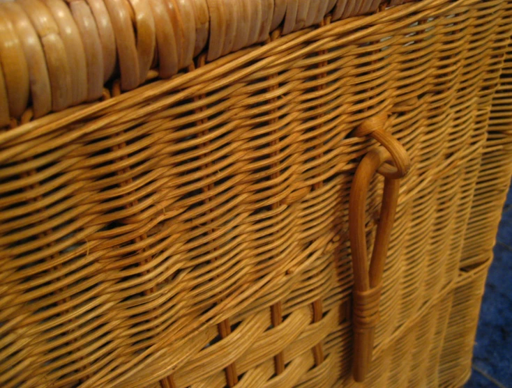 close up view of a basket handle on a chair