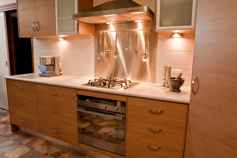 the kitchen is equipped with all stainless steel appliances