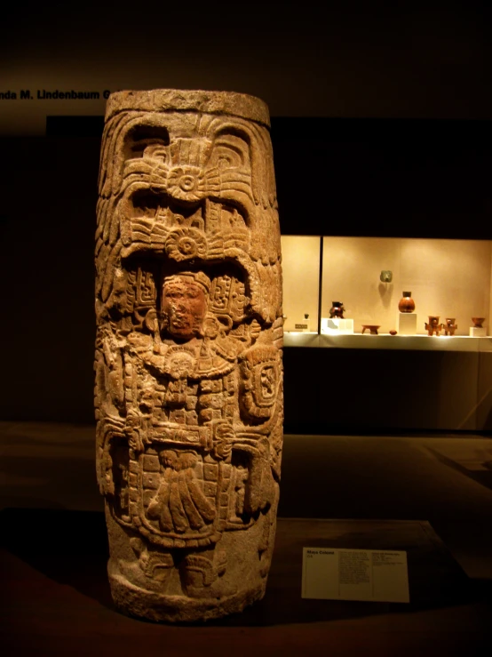 there is a large carved stone object that is on display