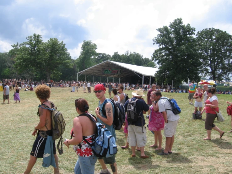 a group of people standing in a park