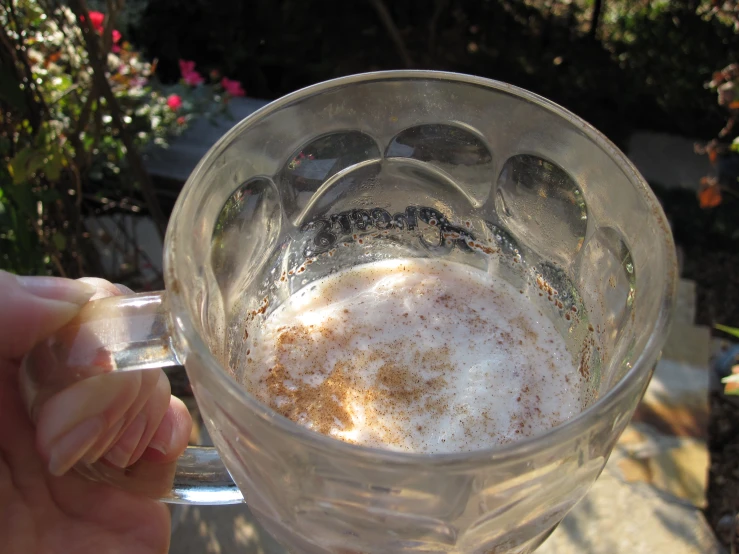 the pitcher of an iced coffee is filled with sugar