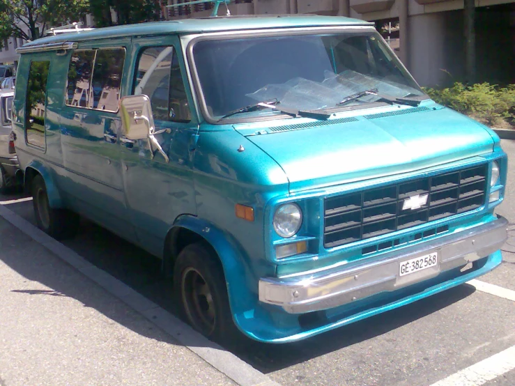 the green van has the passenger seat folded down