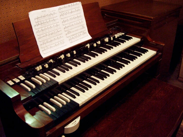 an organ with several notes on it