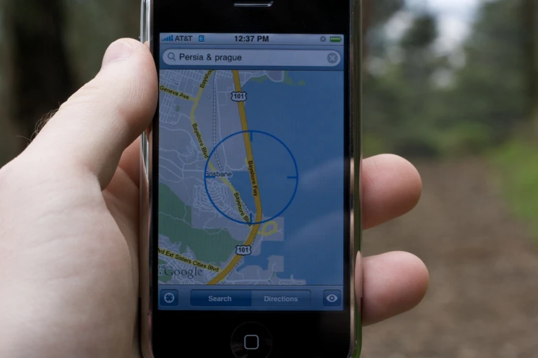 an iphone holding a map of a small area