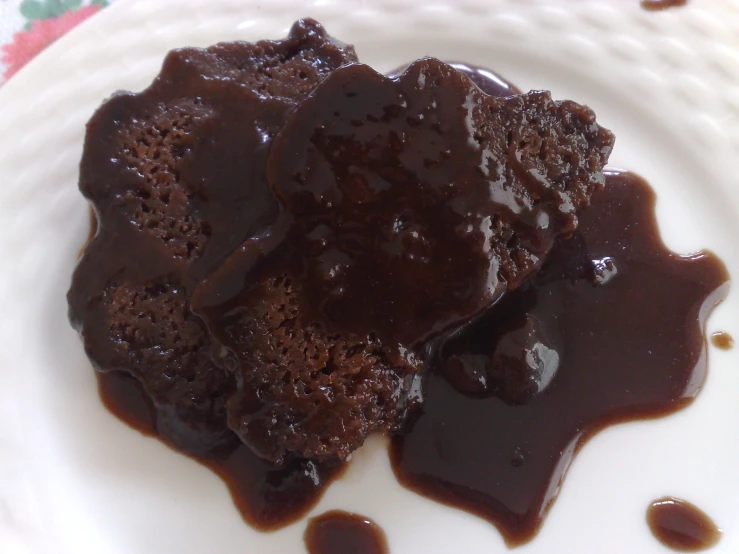 a brownie sitting on top of a white plate