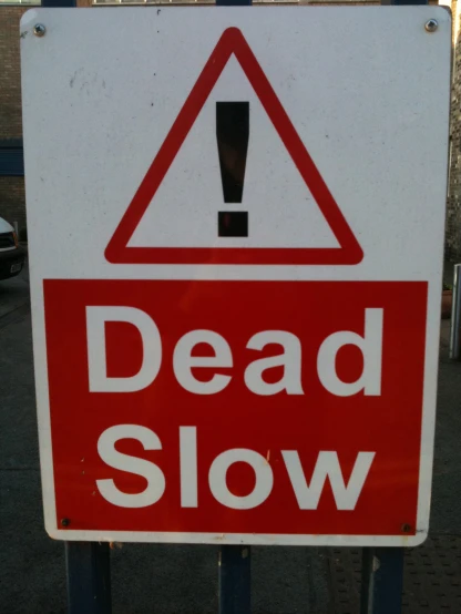 this is a dead slow sign with the words, who was on it?