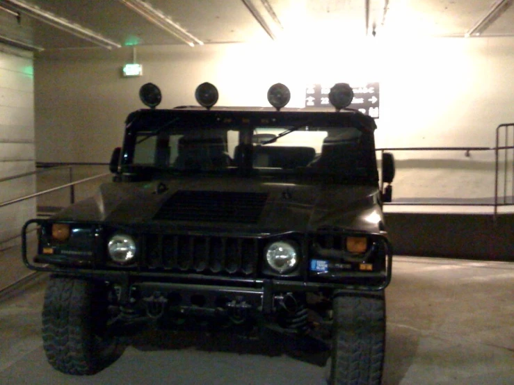 a large vehicle is parked in the parking garage