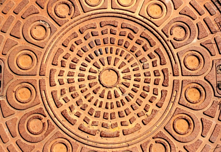 the circular shaped pattern on top of the tiled floor