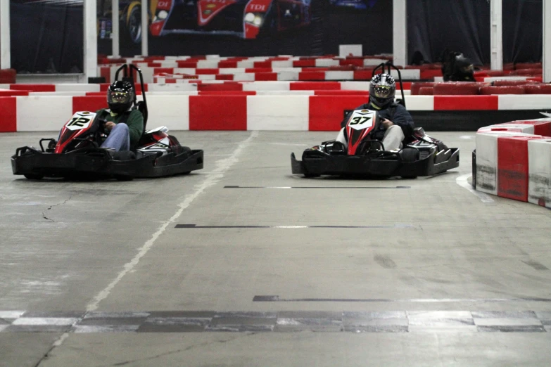 some guys are having a good time on the go kart race