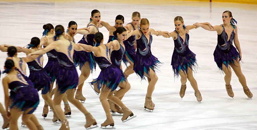 there are some people skating on ice