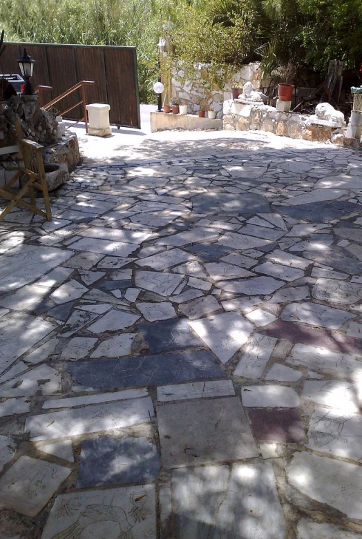 a cobblestone pathway in an outdoor setting