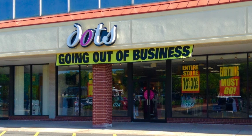 a store front for a hair salon that is closed