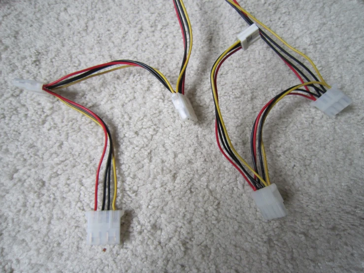 a couple of wires are connected to a box