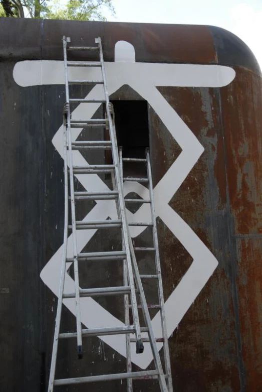 a ladder up into a large piece of machinery