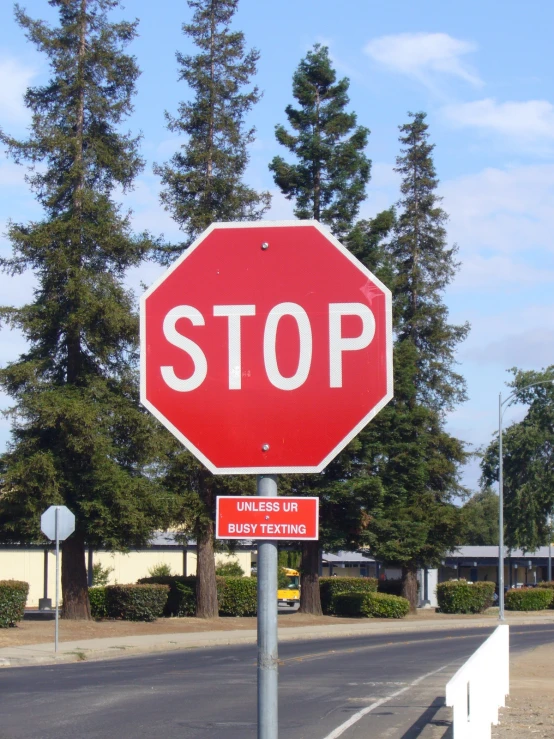 the stop sign has an interesting pattern and stickers