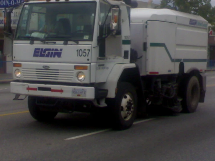 the truck is white and green