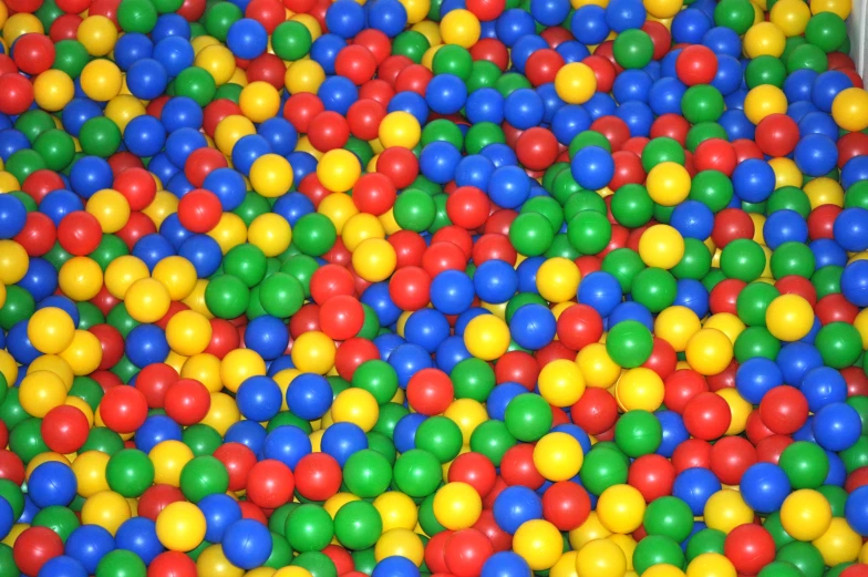 a bunch of ball pit with multiple colors and size