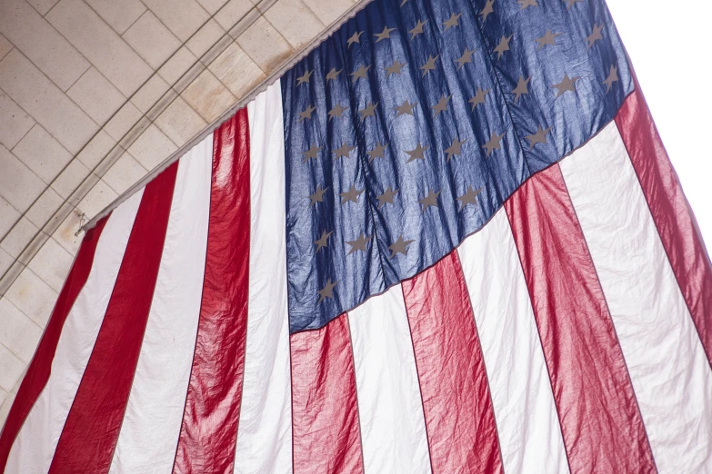 american flag being displayed on the wall