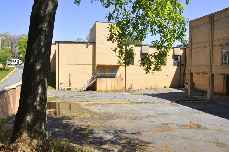 a building on the edge of an empty street