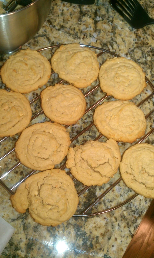 several cookies cooling on a wire rack