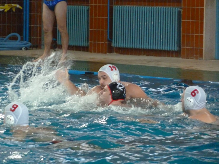 two people in the water on their backs