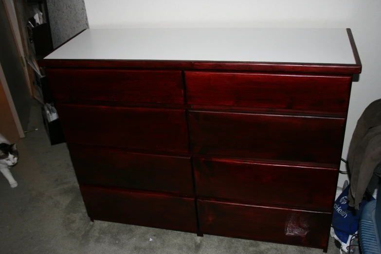 the side view of a dresser in the room