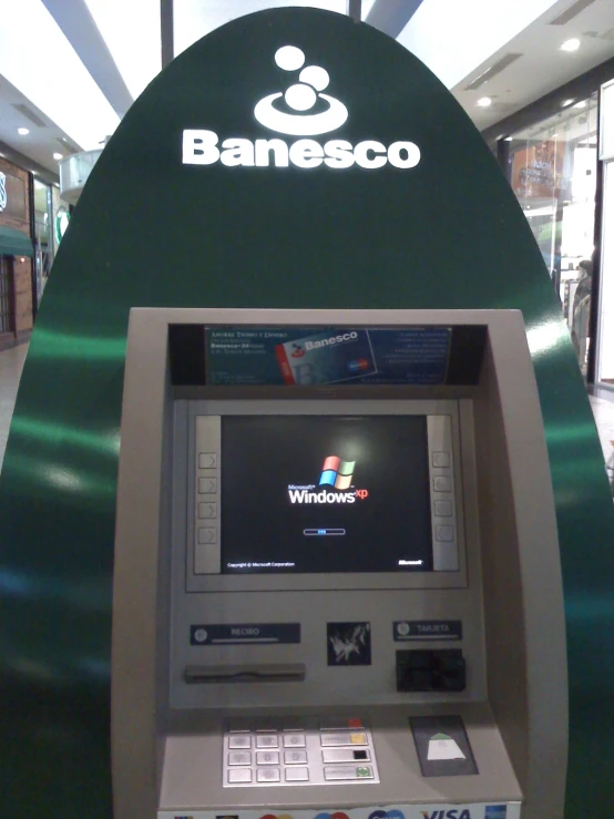 a digital ticket vending machine sits inside of a store