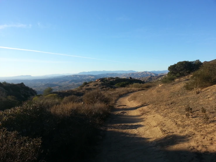 this is a very beautiful day at the top of a hill